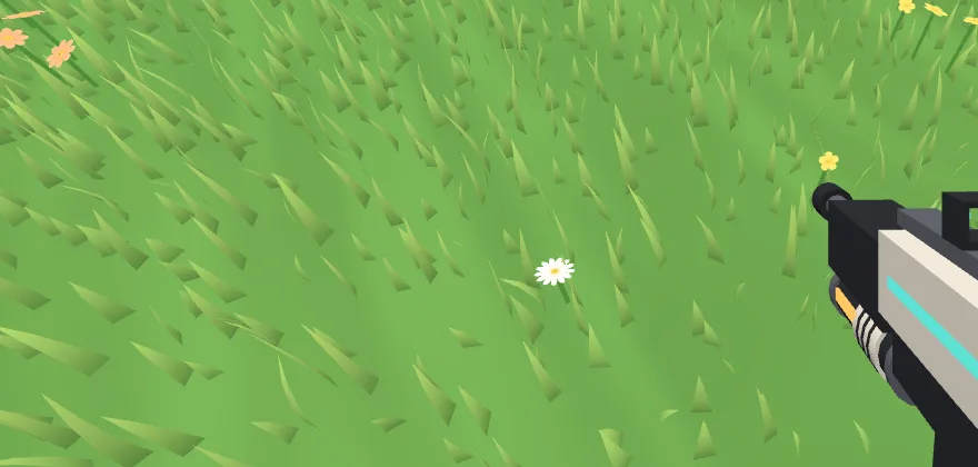 Grass seen from eye height looking down: many sharp, dark-rooted triangular blades.